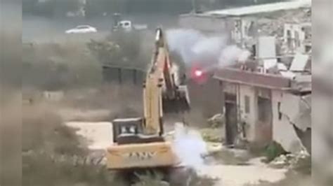 china excavator fireworks|Man in China uses fireworks to fight off bulldozer sent to  .